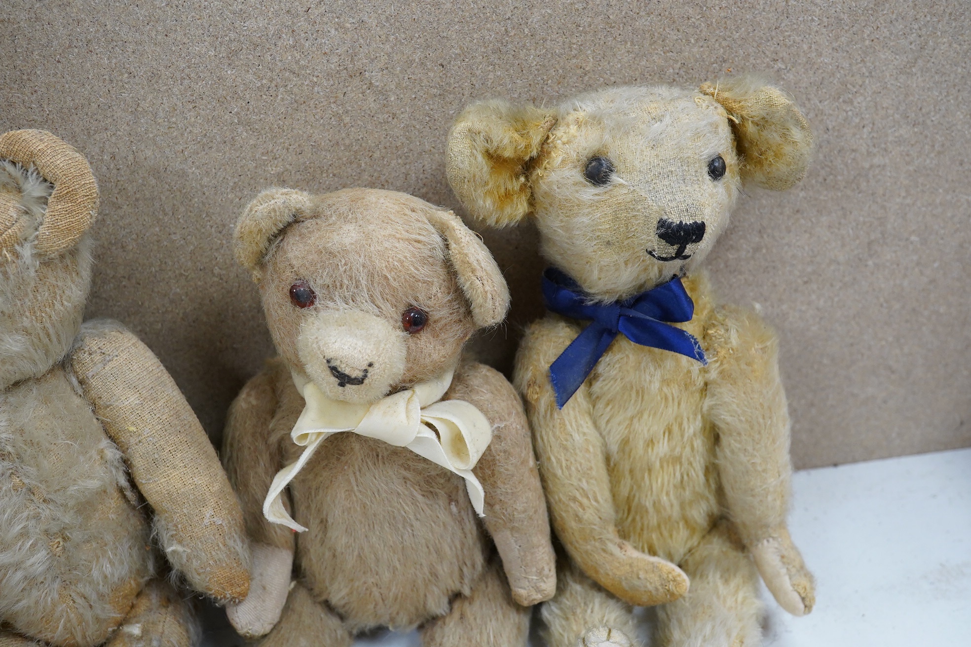 Four bears with restoration, hair loss, one English and three German, c.1930's